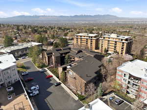 Bird's eye view of a mountain backdrop and apartment complex