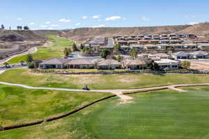 View of home's community featuring a mountain view and golf course view