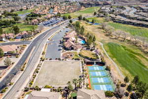 Aerial overview of property's location featuring nearby suburban area