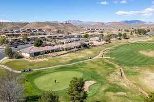Aerial view of residential area featuring a mountainous background