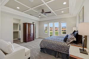 Bedroom featuring coffered ceiling, french doors, a ceiling fan, recessed lighting, and access to outside