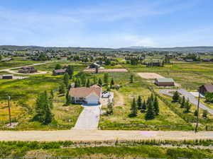 Overview of rural landscape featuring a mountain backdrop