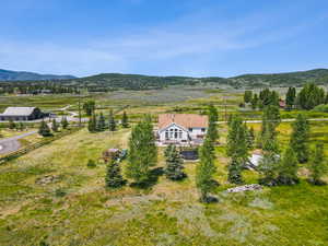 Overview of rural landscape featuring mountains
