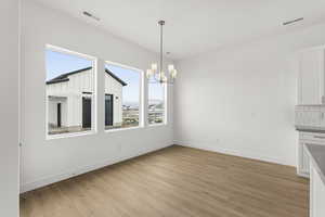 Dining area with a view of the shop in the back yard.
