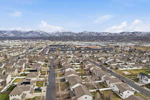Aerial perspective of suburban area featuring mountains