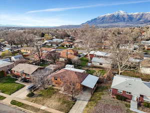 Aerial view of residential area with a mountain backdrop