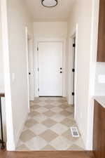 Hallway featuring baseboards