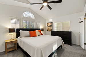 Bedroom with carpet and ceiling fan