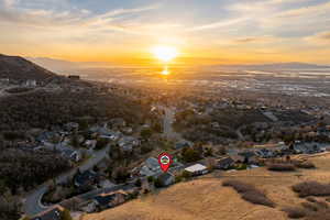 Aerial view of residential area featuring a mountain backdrop
