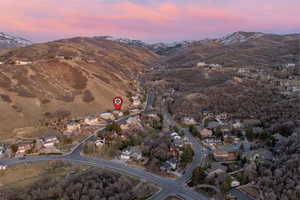 Aerial view of residential area with a mountainous background