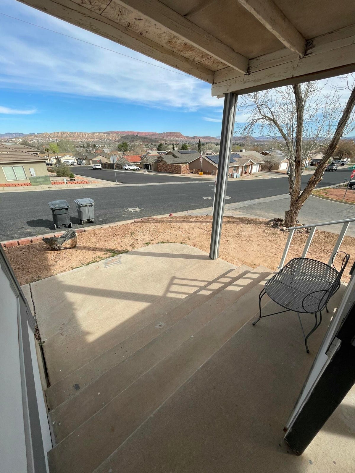 Patio / terrace featuring a residential view