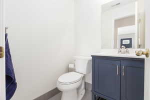 Bathroom with toilet and vanity
