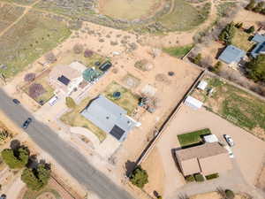 Aerial view of property and surrounding area with rural landscape