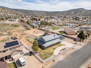 Aerial view of residential area featuring mountains