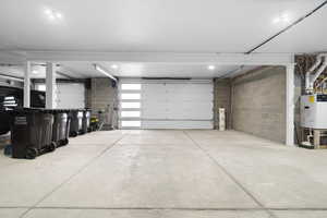 Oversized 3-car Heated Garage w/ Hose Bibs, and 240V charging capacity.