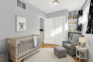 Virtually staged as a nursery to show functionality.