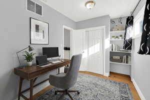 Virtually staged as an office to show functionality.