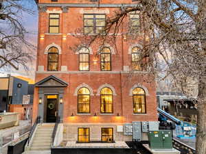 Italianate-style house with brick siding