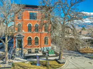 Italianate house featuring brick siding