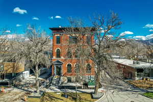 Italianate-style house with brick siding
