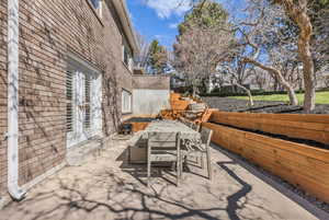 View of patio with outdoor dining area