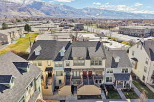 Aerial view of residential area featuring mountains