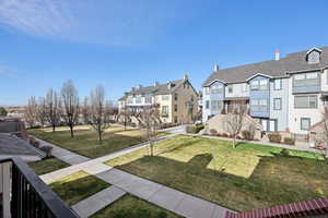 View of home's community with a residential view and a balcony