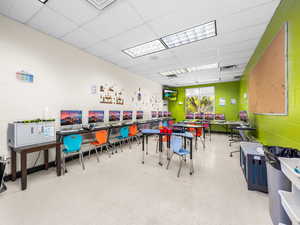 Home office with a paneled ceiling