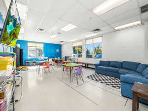 Playroom featuring a drop ceiling