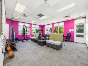 Community lobby featuring a drop ceiling