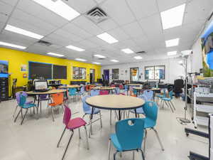 Miscellaneous room featuring a paneled ceiling