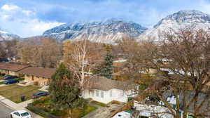 View of mountain backdrop with nearby suburban area