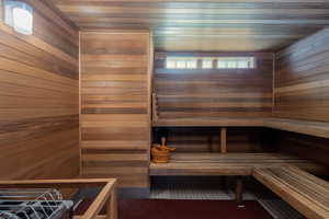 Sauna / steam room with wooden walls and wood ceiling