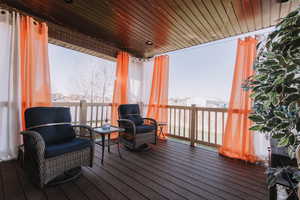 Wooden terrace with outdoor furniture