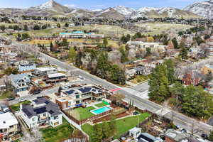 Aerial view of residential area featuring a mountain backdrop