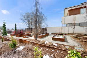 View of yard with a vegetable garden