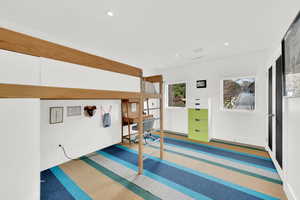 Bedroom with baseboards and recessed lighting