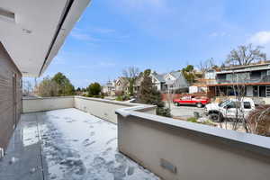 Balcony featuring a residential view