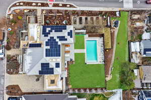 Drone / aerial view of a pool area