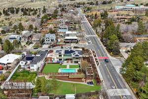 Aerial perspective of suburban area with a pool