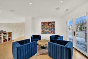 Sitting room featuring recessed lighting and french doors