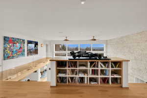 Interior space with light wood-style flooring and recessed lighting