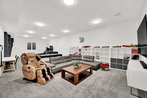 Living area with light carpet