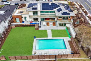 View from above of property featuring a pool area