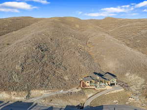 View from above of property featuring a mountainous background