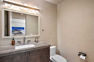 Bathroom featuring toilet and vanity