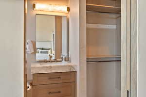 Ensuite bathroom featuring vanity