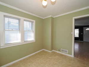 Dining area between the living room and the kitchen.