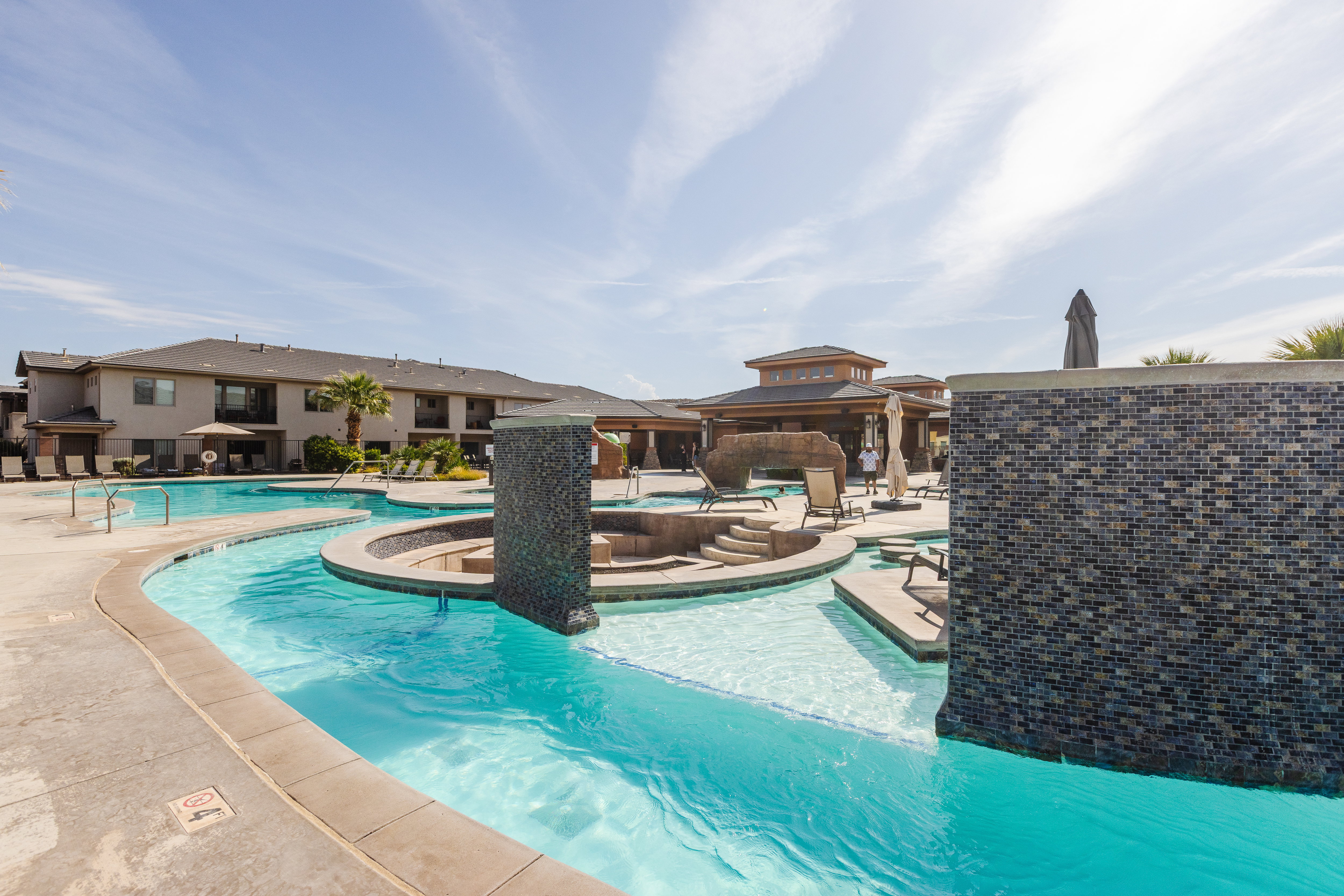 Community pool with a patio and a gazebo