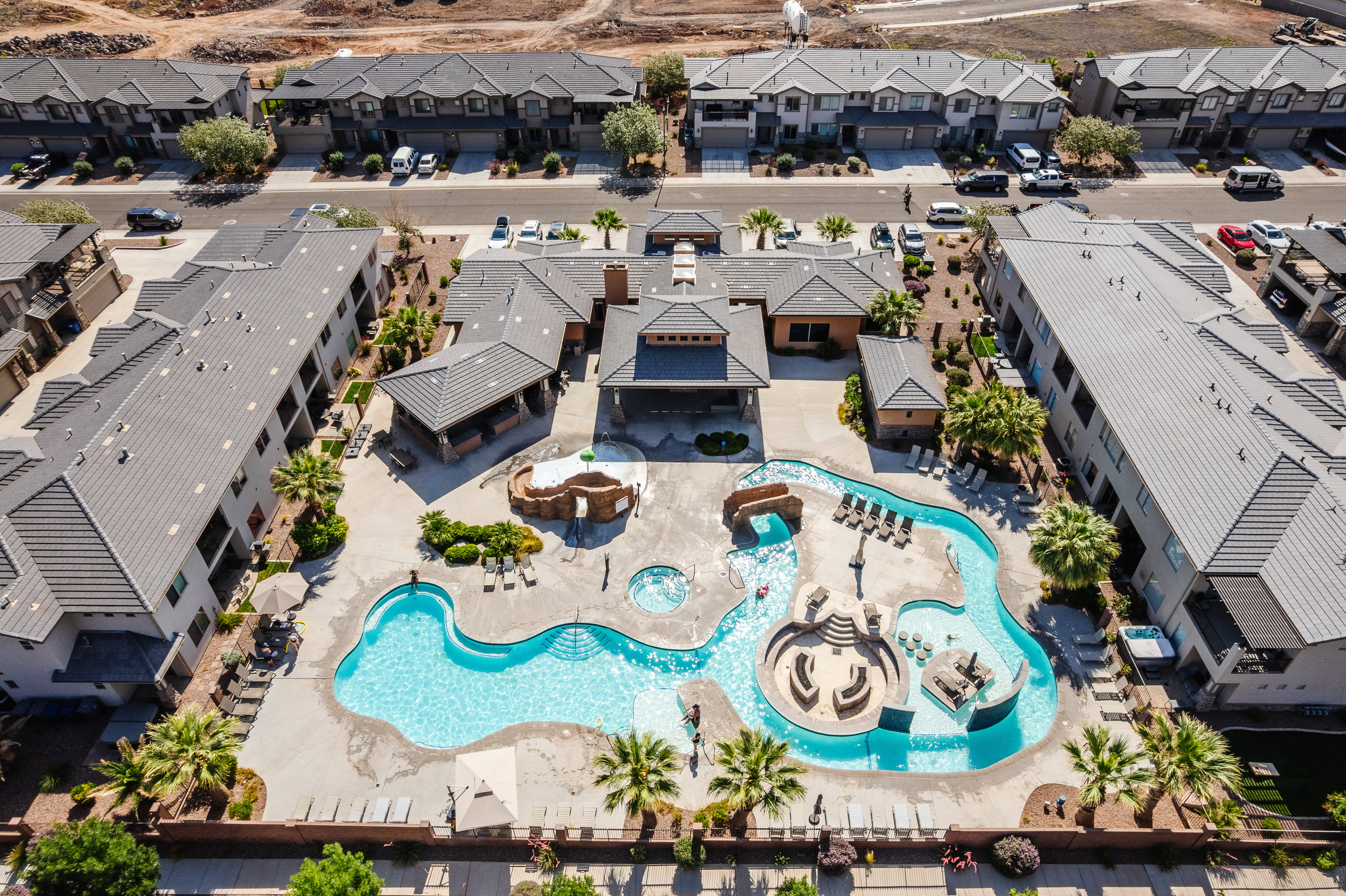 Aerial perspective of suburban area with a pool